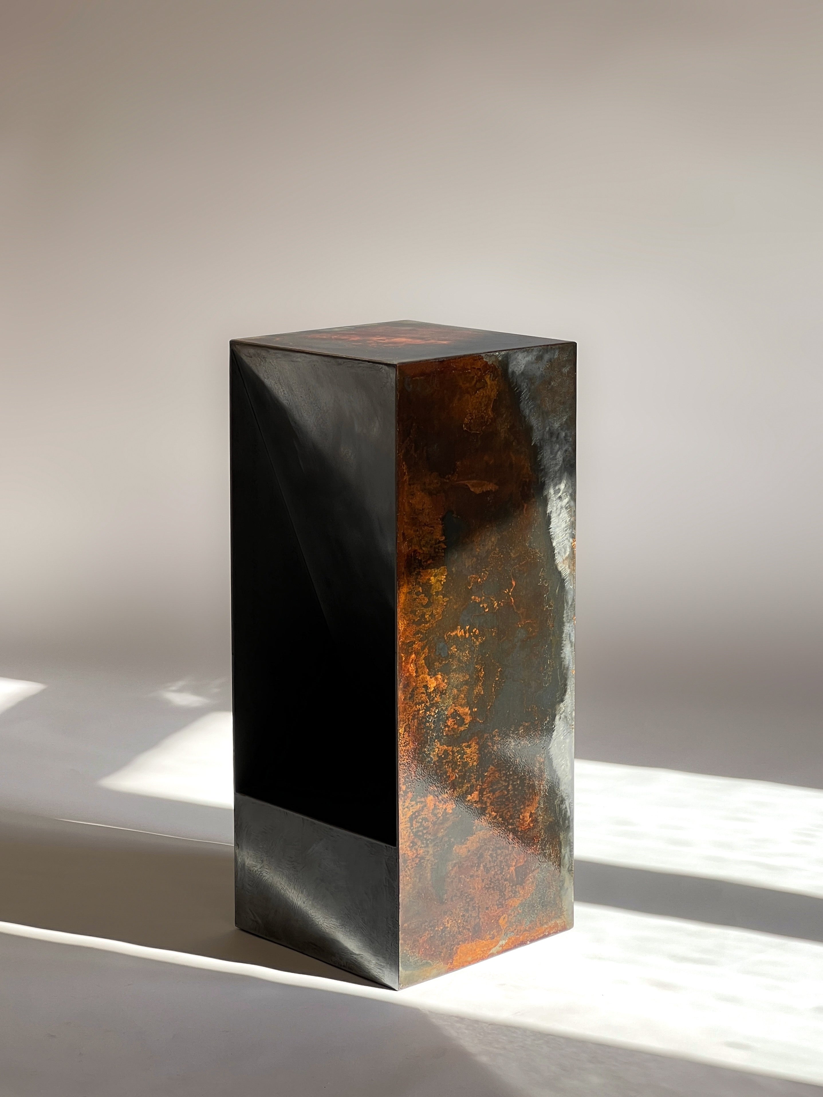 Limited edition 'THE BOX' bar stool by Baker Street Boys, made from rust-patinated raw steel in a minimalist, luxury contemporary design.