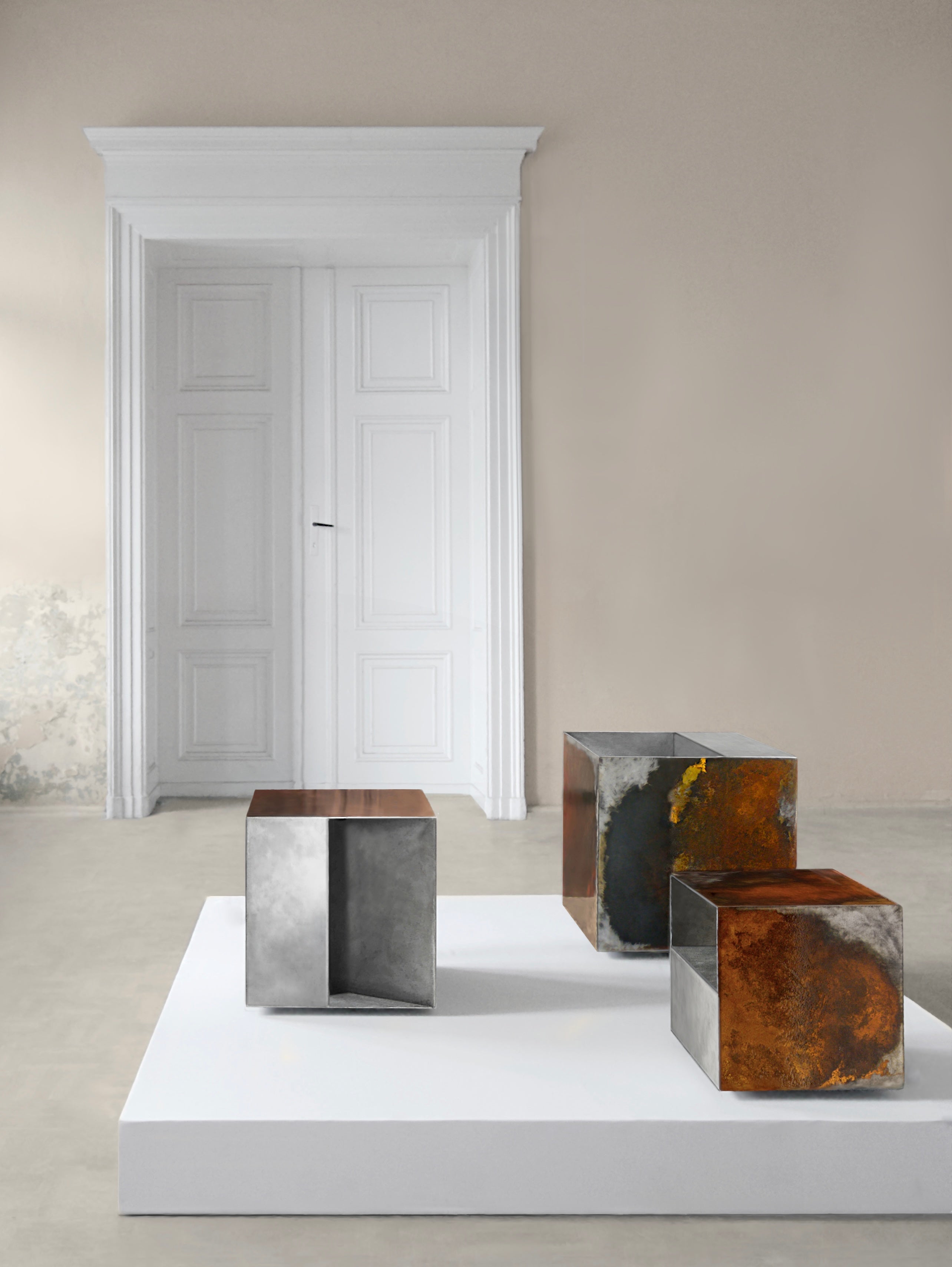 Limited edition ‘THE BOX Tables’ – three cube-shaped coffee tables of different heights, crafted from rusted raw steel in a luxury contemporary design.