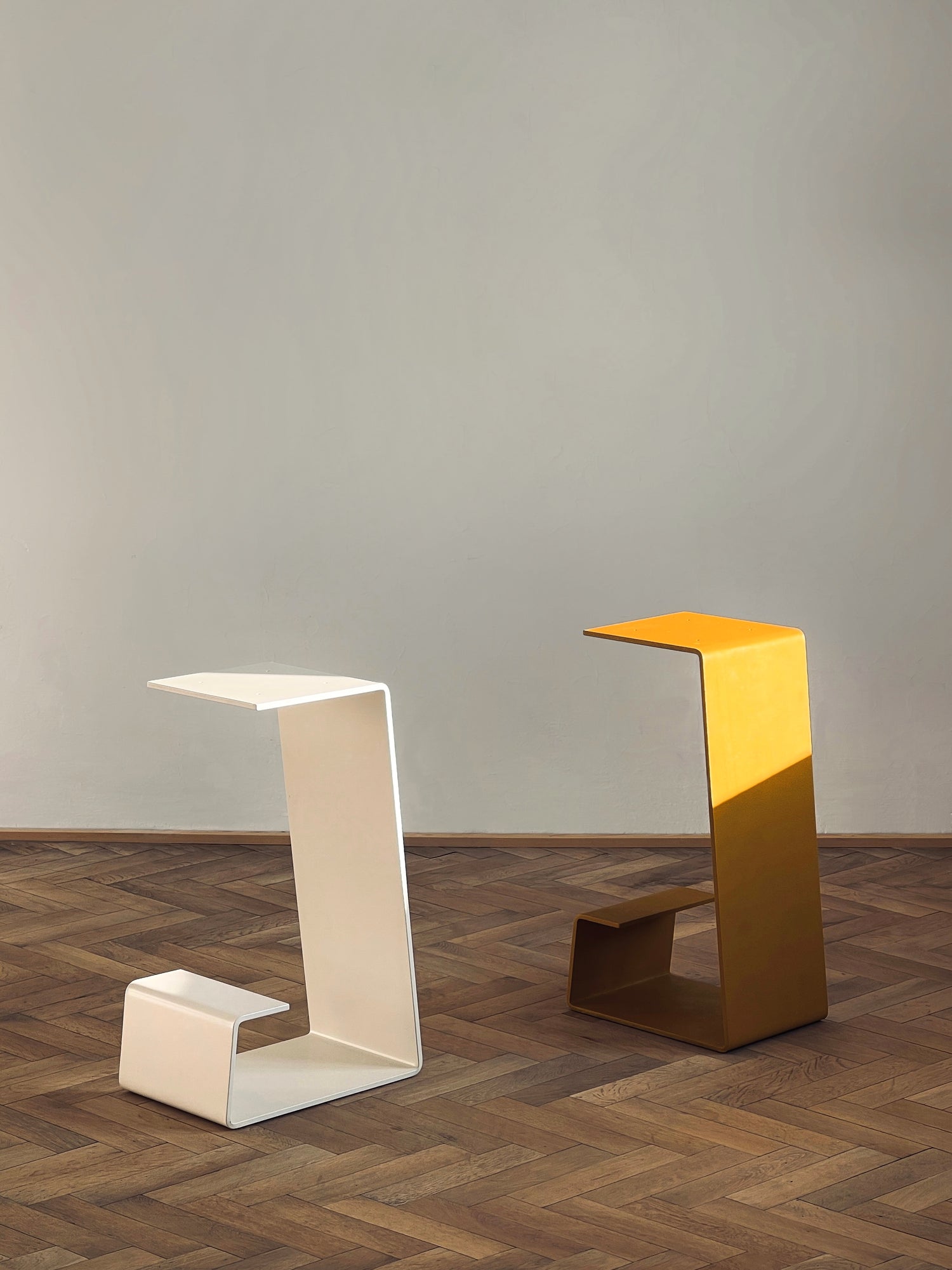 THE PURE Bar Stool in Foam White and Bee Yellow – minimalist luxury furniture photographed on parquet floor